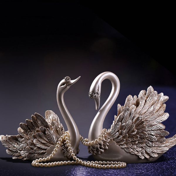 статуэтки лебедей