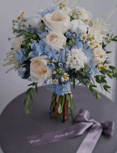 свадебный букет из ромашек